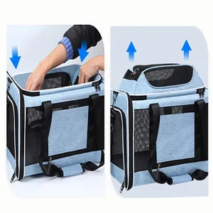 Detail view showing the foldable and expandable structure of the blue pet carrier bag.
