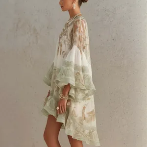 Elegant boho floral print ruffle dress with flowy flared sleeves for resort wear