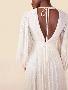 Elegant white backless maxi dress with pleated lantern sleeves and jacquard texture