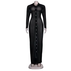 Detailed view of the sheer black mesh long-sleeved maxi shirt dress on a mannequin