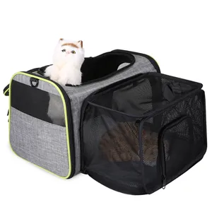 Detailed view of the expandable mesh compartment on the breathable grey pet carrier