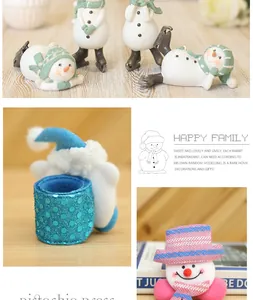 Glowing Christmas snowman slap bracelets featuring blue sequins and pink plush details