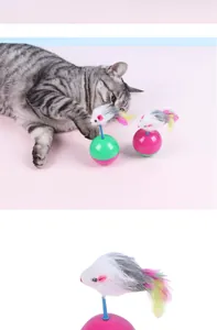 Detailed close-up of interactive plush mouse cat tumbler toy with feather accents