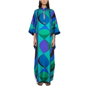 Elegant summer blue geometric print kaftan maxi dress with tie-neck and wide sleeves
