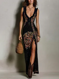 Detailed view of sleeveless boho maxi dress with paisley digital print and side slit
