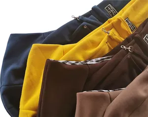 Detailed view of solid color crossbody pet carrier slings in multiple colors