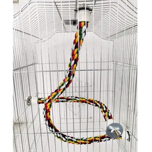 Multicolor cotton rope perch climbing toy for parrots installed in a metal wire cage