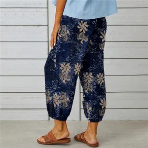 Detailed view of women's vintage floral print cotton linen cropped harem pants with cuffs