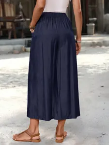 Detailed back view of navy blue loose wide-leg cropped casual pants with elastic waist