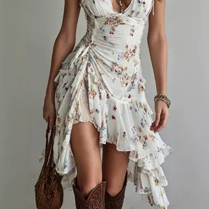 Close-up of a white floral print V-neck dress featuring ruffled details and asymmetrical hem