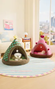 Two cozy enclosed pet tent beds for cats and small dogs in a warm home setting