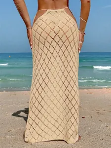 Elegant beige crochet diamond pattern long beach cover-up skirt featuring a sexy lace-up waist