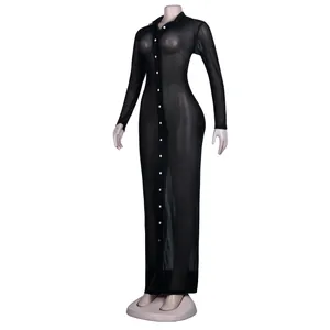 Full-length view of a black sheer mesh long-sleeved button-down dress on a mannequin