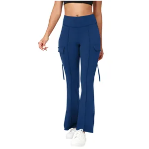 Front view of navy blue high-waisted flare yoga pants with side cargo pockets and straps