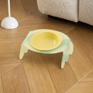 Ergonomic tilted ceramic pet bowl with translucent acrylic stand for cats and dogs