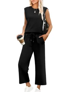 Women's black sleeveless two-piece set with round neck tank top and casual pants.
