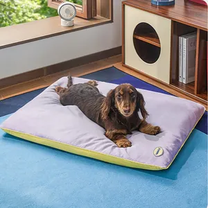 Waterproof purple and yellow rectangular pet bed mat for dogs and cats in home setting