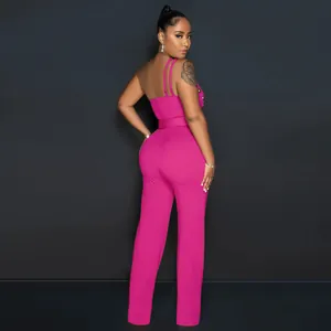 Back view detail of a vibrant pink one-shoulder wide-leg jumpsuit for women