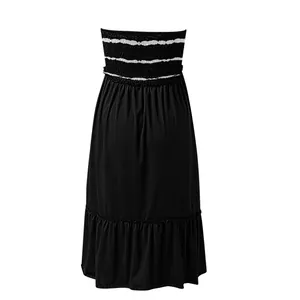Elegant strapless black smocked dress with white stripes and tiered ruffled hemline