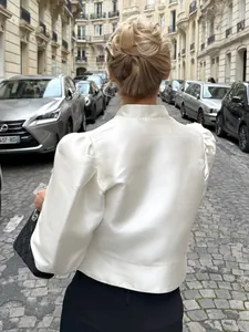 Vintage satin puff sleeve blouse with stand collar for elegant retro office wear.