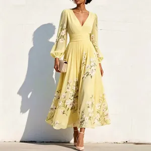 Elegant yellow floral long sleeve V-neck pleated maxi dress with digital print details.