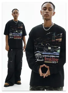 Detailed view of retro car graphic on a heavy washed black cotton t-shirt