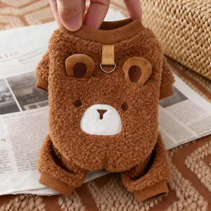 Close-up detail of cozy brown bear pet fleece coat with leash D-ring attachment