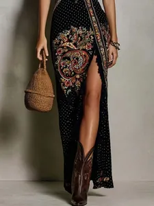 Detailed view of bohemian floral print maxi dress featuring a high side slit design