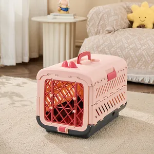 Pink foldable pet carrier aviation box for cats and dogs in a cozy home setting