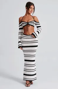 Full view detail of a chic black and white striped crochet set with halter top and skirt.
