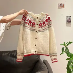 Vintage style Fair Isle knit cardigan featuring floral patterns and button-up front design