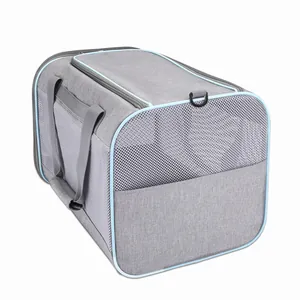 Vista detallada de la bolsa de transporte gris transpirable para mascotas con bordes
