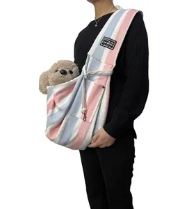 Comfortable striped canvas pet sling carrier bag for cats and small dogs on white background