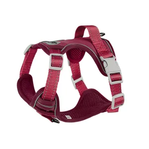 Close-up of a burgundy reflective dog harness vest with adjustable grey buckles and mesh.