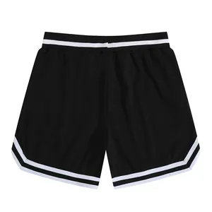 Back view of black mesh athletic shorts with white striped waistband and trim details.
