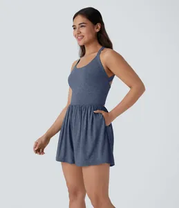 Women's sleeveless racerback romper with side pockets and elastic waist in heathered blue