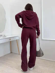 Detailed back view of a burgundy hooded sweatshirt and wide-leg jogger pants two-piece set