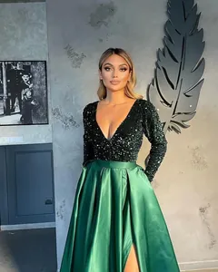 Elegant emerald green evening gown with sequined V-neck bodice and high-slit satin skirt