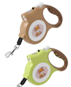 Retractable dog leashes in brown and lime green with built-in LED light for night walks