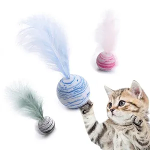 Colorful macaron-style plush cat ball toys with soft feathers for kitten interactive play