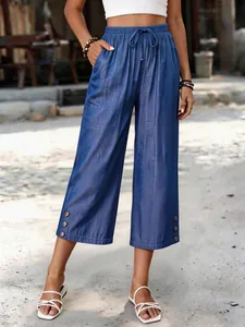 Elegante blaue Tencel-Denim-Hose in 3/4-Länge mit Kordelzug und weitem Beinschnitt