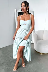 Elegant light blue spaghetti strap maxi dress featuring a chic waist cutout detail