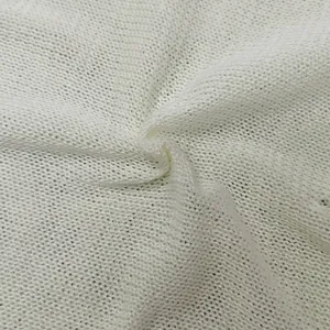 Primer plano macro de la textura de la tela de punto calada blanca transpirable para verano