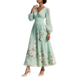 Elegant mint green maxi dress with floral print, deep V-neck, long sleeves, and pleated waist
