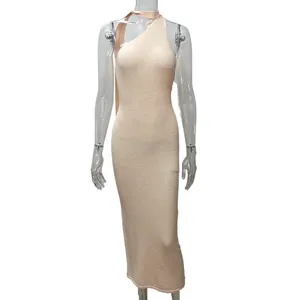 Close-up detail of peach one-shoulder bodycon maxi dress with ribbed knit texture