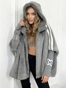Women's stylish oversized grey faux fur hooded jacket with knit patchwork sleeve detail
