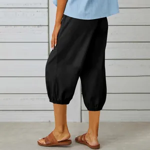 Detail view of black cotton linen cropped harem pants with elasticated cuffs for women