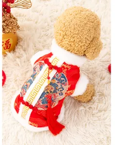 Detailed view of red dragon embroidered dog coat for Lunar New Year celebrations.