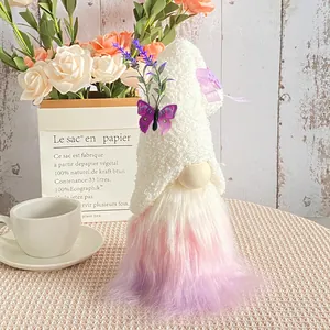 Adorable plush gnome with butterfly and lavender on a rustic wooden background