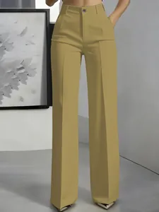 Detailed view of high-waisted khaki straight-leg suit trousers with elegant drape